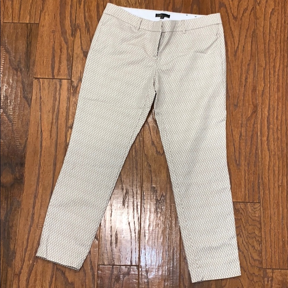 tan and white patterned trousers